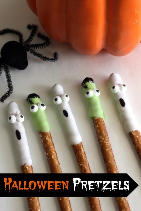 Halloween White Chocolate Covered Ghost and Frankenstein Pretzels | CatchMyParty.com