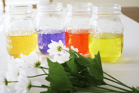 Colored water centerpieces | CatchMyParty.com