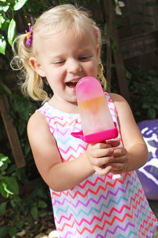 Child with Vitamin Water Rainbow Popsicle | CatchMyParty.com