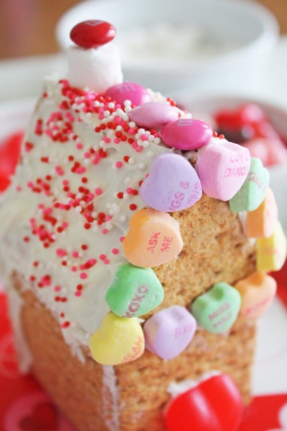 Gently, decorate your house with frosting and all your Valentine's Day candy Spread frosting on the roof and decorate it with colorful red and pink sprinkles. See more party ideas and share yours at CatchMyParty.com