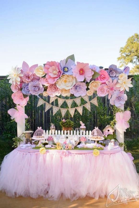 Garden party dessert table with paper flower backdrop | Catchmyparty.com