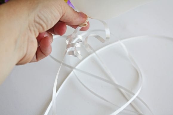 Tied a ribbon at the base of the balloon | CatchMyParty.com