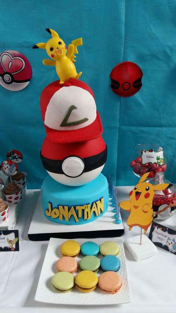 Poké ball and Ash Ketchum's hat birthday cake