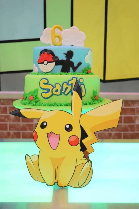 Fondant Ash Ketchum and Poké ball birthday cake