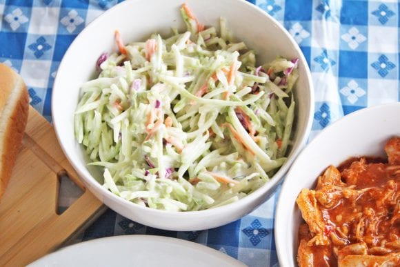 Mixing ingredients for broccoli slaw | CatchMyParty.com