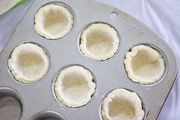 Pressing the Cut Pastry to a Muffin Pan | CatchMyParty.com