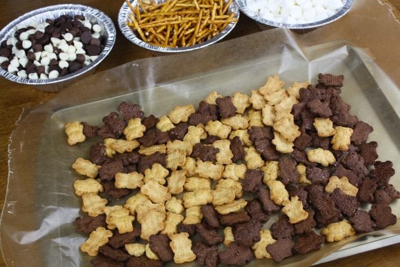 Placed the Vanilla and the Chocolate Teddy Grahams Over the Cookie Sheet | CatchMyParty.com