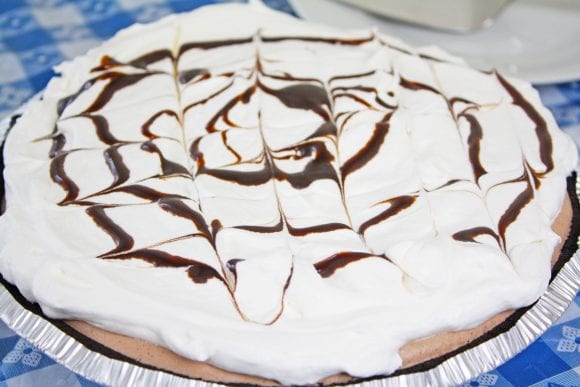 Swirl the chocolate over the whipped cream | CatchMyParty.com