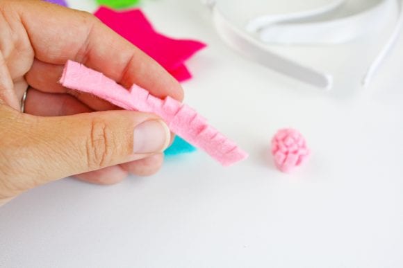 Making the mini pompom flowers | CatchMyParty.com