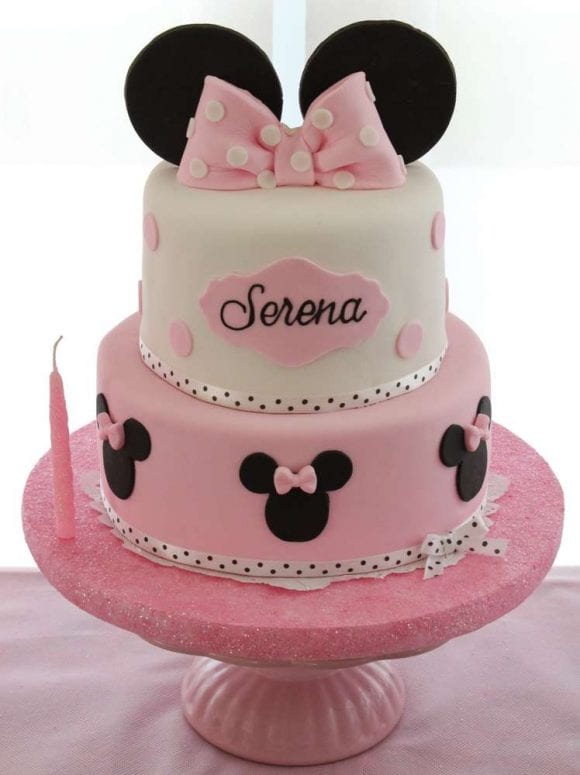 Minnie Mouse Birthday Cake topped with fonfant ears and a large pink polka dot bow