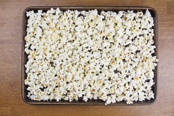 Popcorn spread out in the parchment lining | CatchMyParty.com