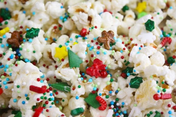Add holiday sprinkles to the coated popcorn | CatchMyParty.com