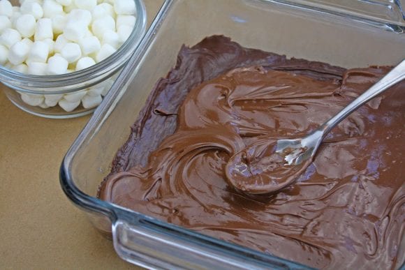 Pour the chocolate chip mixture into the pan | CatchMyParty.com