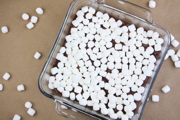 Press the marshmallows into the warm fudge | CatchMyParty.com