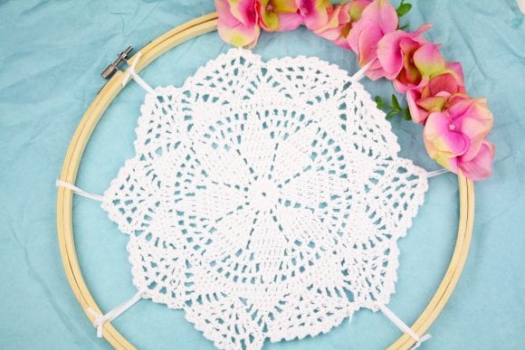 Tie the crocheted doily using white ribbon | CatchMyParty.com