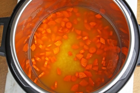 Add carrots to the rice | CatchMyParty.com
