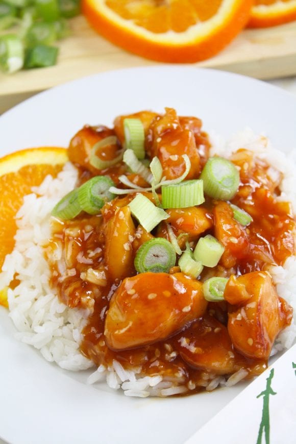 Garnished green onions over the orange chicken | CatchMyParty.com
