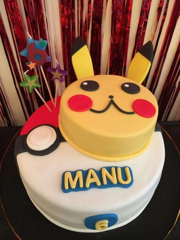 Pikachu and Poké Ball tiered birthday cake