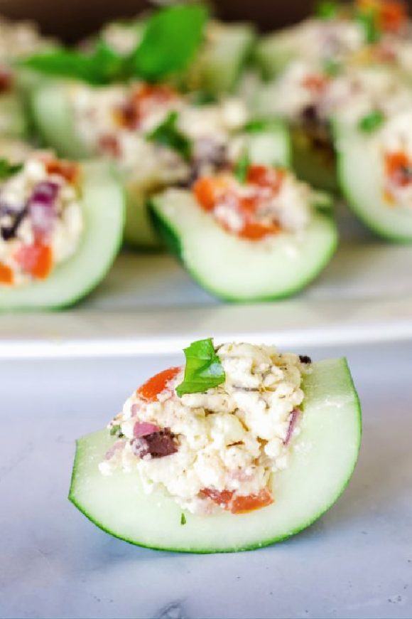 Greek Salad Stuffed Cucumber Bites | CatchMyParty.com Greek Salad Stuffed Cucumber Bites