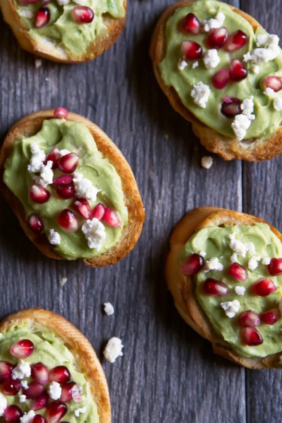 Whipped Feta & Avocado Crostini with Pomegranate | CatchMyParty.com Whipped Feta & Avocado Crostini with Pomegranate