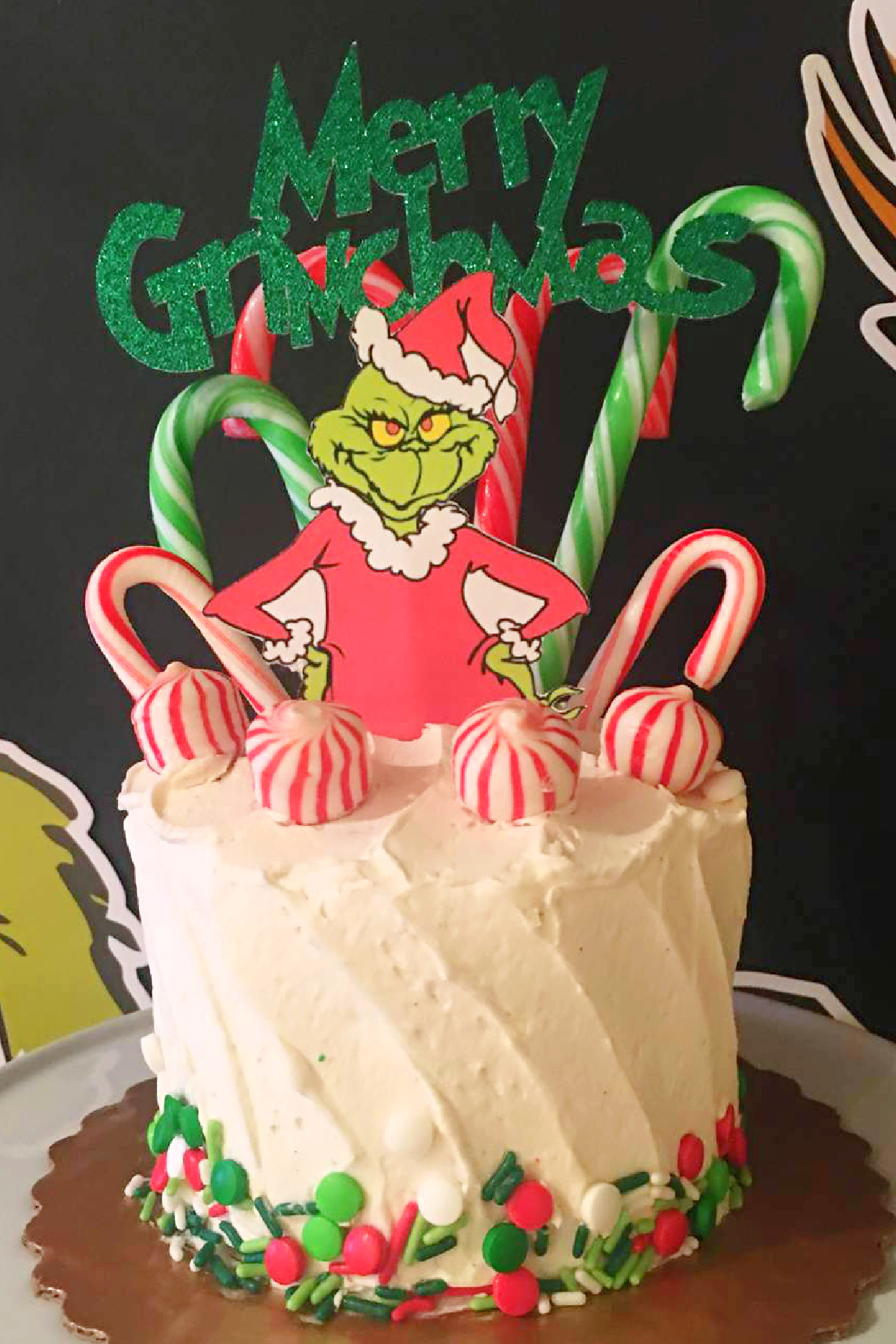Merry Grinchmas Cake with Candy Canes and Toppers Merry Grinchmas Cake with Candy Canes and Toppers