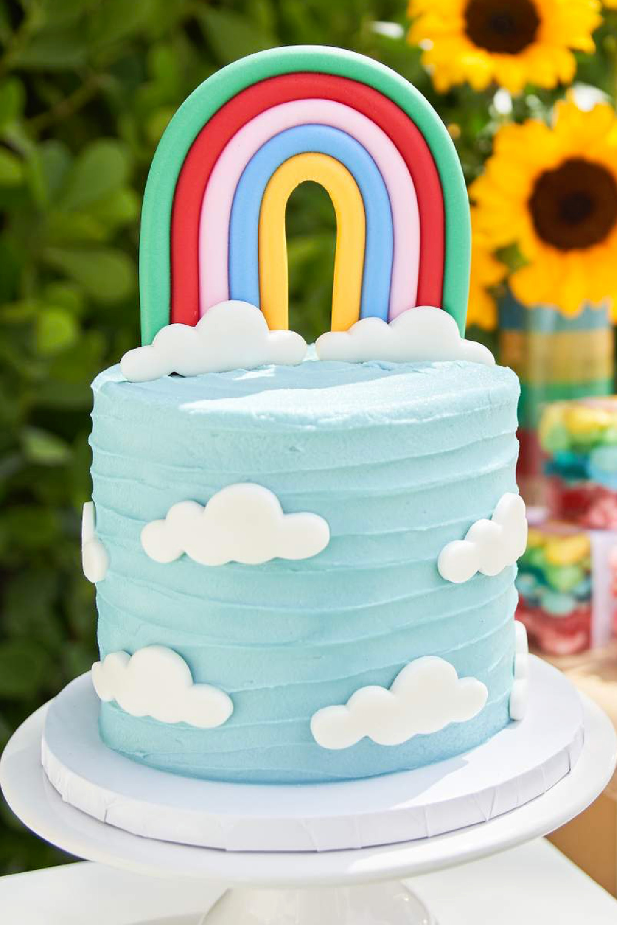 Blue Sky Birthday Cake Topped with Rainbow Topper